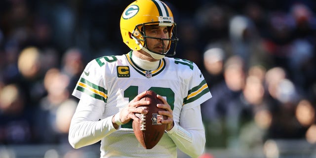 Aaron Rodgers of the Green Bay Packers looks to pass against the Chicago Bears during the first half of the game at Soldier Field on Dec. 4, 2022, in Chicago.