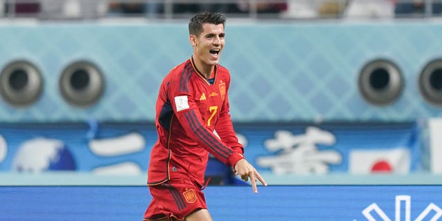 Alvaro Morata of Spain celebrates after scoring his team's first goal during the World Cup Group E match against Japan at Khalifa International Stadium in Doha, Qatar, on Thursday.