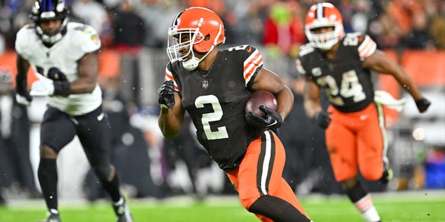 Amari Cooper (2) of the Cleveland Browns carries the ball following a reception against the Baltimore Ravens during the third quarter at FirstEnergy Stadium Dec. 17, 2022, in Cleveland.