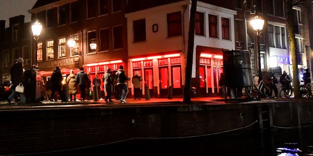 De Wallen, Amsterdam's red-light district, is internationally known and one of the main tourist attractions of the city. It offers legal prostitution and a number of coffee shops that sell marijuana. 