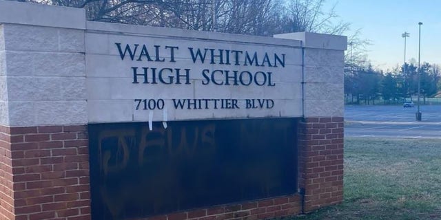 Graffiti found outside of Walt Whitman High School on Saturday said 