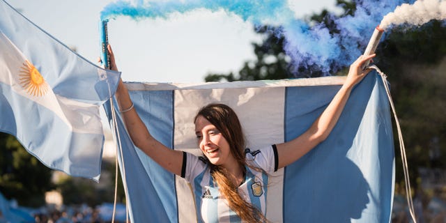 Fans of the Argentine national team in the city of Buenos Aires supporting their team the day of the Qatar 2022 FIFA World Cup final against the France national football team in front of the obelisk of Plaza de la Republica, Buenos Aires, Argentina on December 18, 2022.