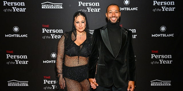 Ashley Graham was joined by her husband and film director Justin Ervin, who wore a black velvet tuxedo jacket over a turtleneck. 