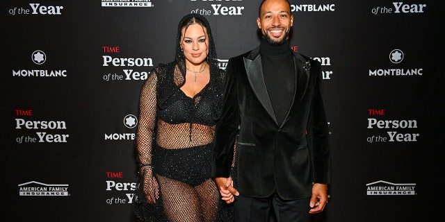 Ashley Graham was joined by her husband and film director Justin Ervin, who wore a black velvet tuxedo jacket over a turtleneck.