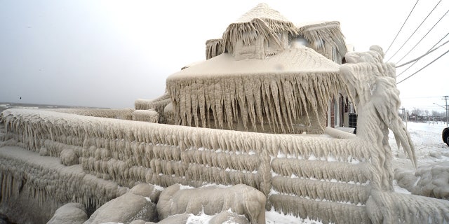 Ice covers Hoaks restaurant along the Lake Erie shoreline on December 24, 2022, in Hamburg, New York.