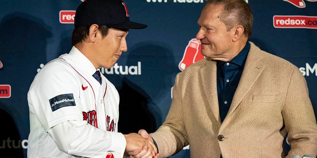 Agent Scott Boras introduces Masataka Yoshida, #7 of the Boston Red Sox, during a press conference announcing his contract agreement with the team on December 15, 2022, at Fenway Park in Boston, Massachusetts.