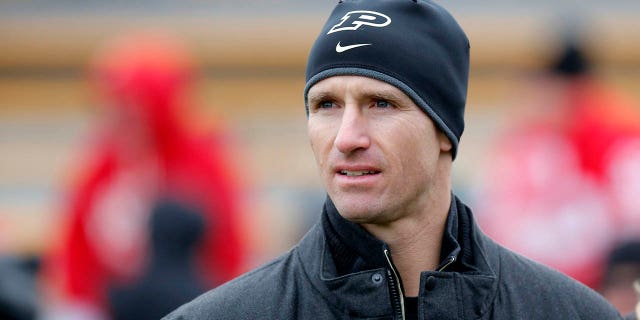 Former Boilermaker and New Orleans Saints quarterback Drew Brees watches a game between the Wisconsin Badgers and Purdue Boilermakers Nov. 19, 2016, at the Ross-Ade Stadium, West Lafayette, Ind.