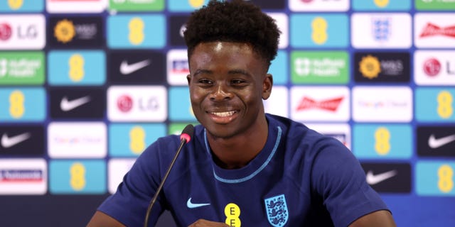 Bukayo Saka of England speaks during the England Press Conference on the day after the Round of 16 match against Senegal at Al Wakrah Stadium on December 05, 2022 in Doha, Qatar.