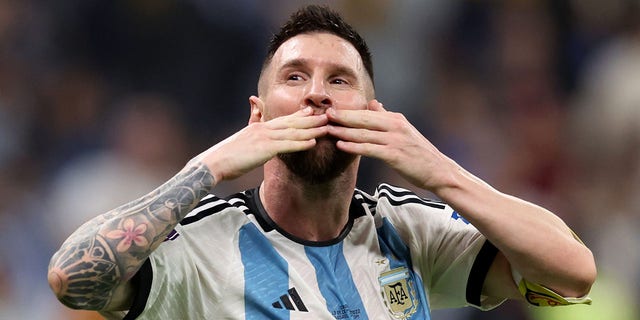 Lionel Messi celebrates after their sides third goal by Julian Alvarez of Argentina (not pictured) during the FIFA World Cup Qatar 2022 semi final match between Argentina and Croatia at Lusail Stadium on December 13, 2022 in Lusail City, Qatar. 