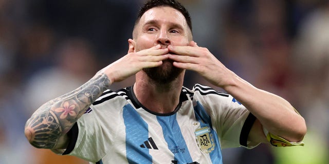 Lionel Messi celebrates after their sides third goal by Julian Alvarez of Argentina (not pictured) during the FIFA World Cup Qatar 2022 semi final match between Argentina and Croatia at Lusail Stadium on December 13, 2022 in Lusail City, Qatar.