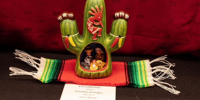 Many of Zahs' Nativity scenes reflect the local culture of the artisan. This one pictured here is from Mexico and features Aztec art. 