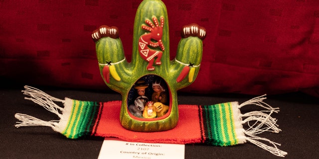 Many of Zahs' Nativity scenes reflect the local culture of the artisan. This one pictured here is from Mexico and features Aztec art.