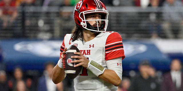Cameron Rising #7 of the Utah Utes looks to throw a pass against the USC Trojans during the second quarter in the Pac-12 Championship at Allegiant Stadium on Dec. 2, 2022 in Las Vegas, Nev.