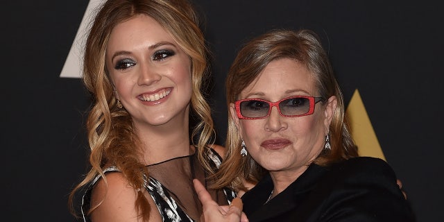 Carrie Fisher hugs daughter Billie Lourd