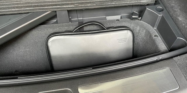 A portable charging cable is stored in an attache-style case under the loadspace floor, along with a removable cargo cover.