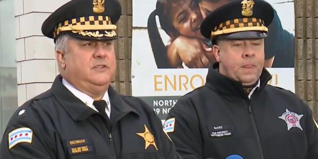 Chicago police speak to reporters about a shooting that left three dead and one wounded outside a bar on West School Street early Sunday.