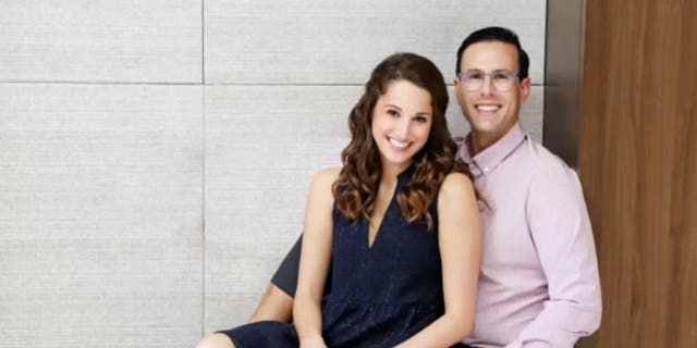 Wendi Reichstein and her fiancé pose for a photo. Her fiancé had his flight cancelled by Southwest five days before their wedding amid the 2022 blizzards. 