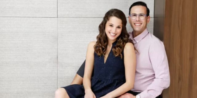 Wendi Reichstein and her fiancé pose for a photo. Her fiancé had his flight cancelled by Southwest five days before their wedding amid the 2022 blizzards.