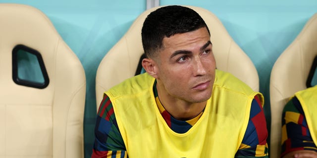 Cristiano Ronaldo of Portugal looks on with teammates prior to a FIFA World Cup Qatar 2022 round of 16 match against Switzerland at Lusail Stadium Dec. 6, 2022, in Lusail City, Qatar.