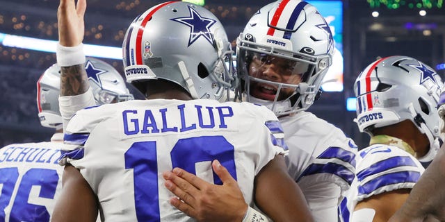 Dak Prescott #4 of the Dallas Cowboys celebrates with Michael Gallup #13 of the Dallas Cowboys after a touchdown in the second quarter of a game Indianapolis Colts at AT&amp;T Stadium on December 04, 2022, in Arlington, Texas.