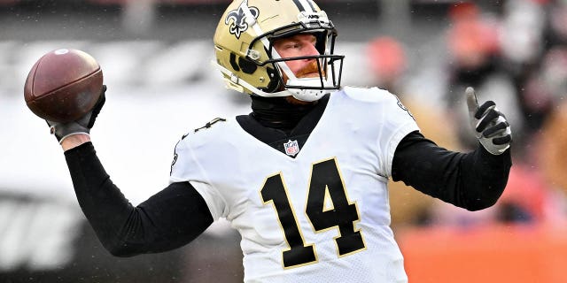 Andy Dalton #14 of the New Orleans Saints throws a pass during the second half in the game against the Cleveland Browns at FirstEnergy Stadium on December 24, 2022 in Cleveland, Ohio. 