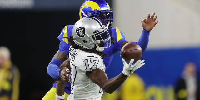 Davante Adams #17 of the Las Vegas Raiders makes a reception against Jalen Ramsey #5 of the Los Angeles Rams during the first quarter at SoFi Stadium on December 08, 2022 in Inglewood, California.