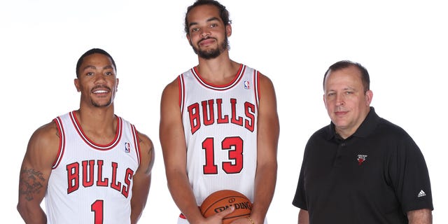 Derrick Rose (1), Joakim Noah (13) and Tom Thibodeau of the Chicago Bulls pose for a portrait during media day Sept. 17, 2013, at Berto Center in Deerfield, Ill. 