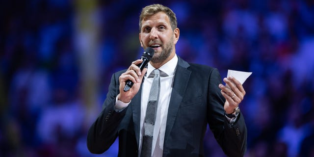 Dirk Nowitzki gives a speech during to a jersey retirement prior to the FIBA EuroBasket match at Lanxess Arena on Sept. 1, 2022, in Cologne, Germany.