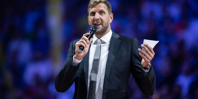 Dirk Nowitzki gives a speech during to a jersey retirement prior to the FIBA EuroBasket match at Lanxess Arena on Sept. 1, 2022, in Cologne, Germany.