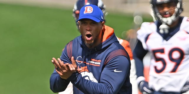 Special Teams Coordinator Dwayne Stukes runs drills will player during practice at UCHealth Training Center on April 27, 2022, in Centennial, Colorado. It was day 3 of minicamp for the Denver Broncos.