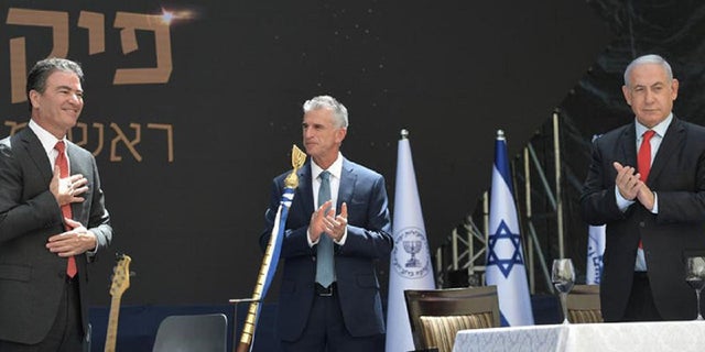 TEL AVIV, ISRAEL - JUNE 1: Israeli Prime Minister Benjamin Netanyahu (R) attends David Barnea's (C) oath-taking ceremony as the new head of the Israeli national intelligence service, Mossad in Tel Aviv, Israel on June 1, 2021. Yossi Cohen (L), the outgoing head of Mossad, also attended the ceremony. 