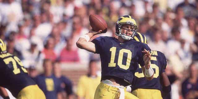 Tom Brady played for the Michigan Wolverines for four seasons.  During his tenure, Brady had a 20–5 record as a starter at Michigan, and won a national championship in 1997.  Brady was drafted 199th overall by the New England Patriots.