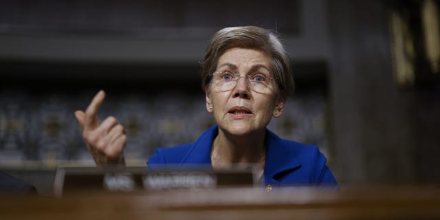 Massachusetts Senator Elizabeth Warren asks questions during a Senate Banking Committee hearing on FTXs collapse