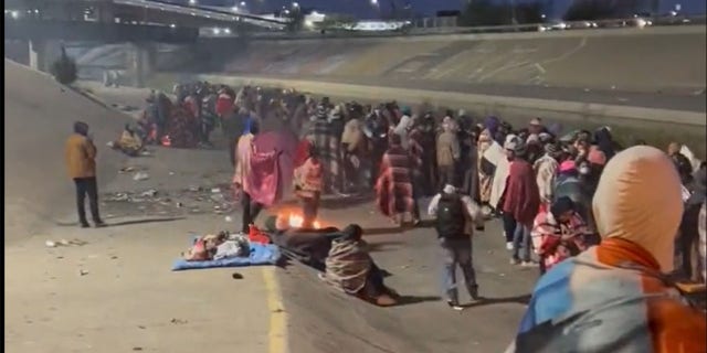 Migrants camp out in El Paso, Texas, on Dec. 13, 2022.