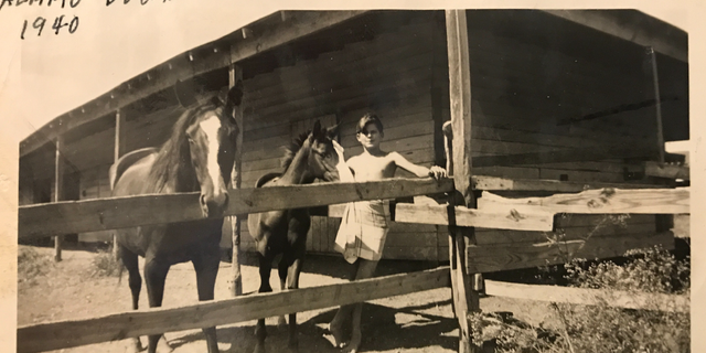 Joe Johnson, age 14, summer 1940, right before he lied about his age and joined the Army.