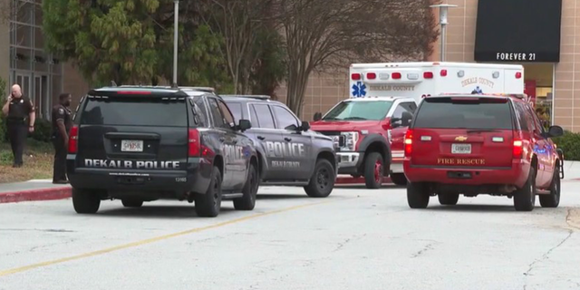 A teenager accidentally fired a gun Saturday while shopping at a mall in Georgia, injuring himself.