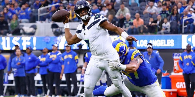 Geno Smith of the Seattle Seahawks throws a pass during the second quarter against the Los Angeles Rams at SoFi Stadium, Dec. 4, 2022, in Inglewood, California.