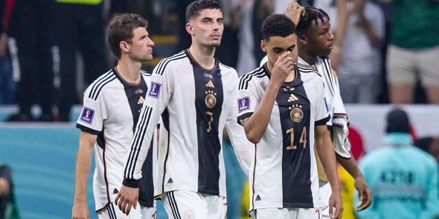 L-R: Germany's Thomas Müller, Kai Havertz, Jamal Musiala and Armel Bella-Kotchap react unhappily after a match. 