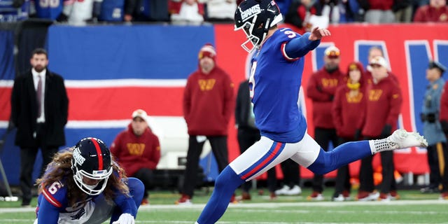 Graham Gano of the New York Giants misses a field goal in overtime against the Washington Commanders at MetLife Stadium on Dec. 4, 2022, in East Rutherford, New Jersey. The game ended in a 20-20 tie.