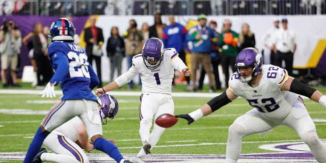 Greg Joseph, #1 of the Minnesota Vikings, kicks a game winning 61-yard field goal as time expires to beat the New York Giants 27-24 at U.S. Bank Stadium on December 24, 2022, in Minneapolis, Minnesota. 