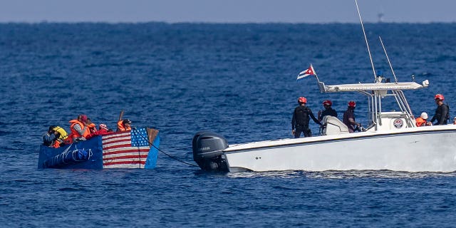 A rickety American-flagged raft was intercepted by Cuban authorities in plain sight off the nation's capital, Havana.