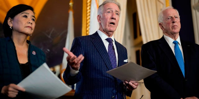 FILE - House Ways and Means Committee Chairman Richard Neal, D-Mass., talks to the media after the House Ways &  Means Committee voted on whether to publicly release years of former President Donald Trump's tax returns during a hearing on Capitol Hill in Washington, Dec. 20, 2022. Left is Rep. Judy Chu, D-Calif., and right is Rep. Mike Thompson , D-Calif.  (AP Photo/J. Scott Applewhite, File)