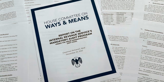 FILE - The report from the House Ways &  Means Committee, regarding the IRS and former President Donald Trump's tax returns, is photographed Dec. 21, 2022. Democrats in Congress have released six years' worth of former President Donald Trump's tax returns.  It's the culmination of a yearslong effort to learn about the finances of a onetime business mogul who broke decades of political norms when he refused to voluntarily release the information as he sought the White House.