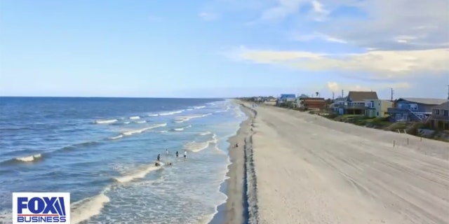 A beautiful stretch of beach in Ponte Vedra, Florida — a location that one couple chose for their place to rest, relax and live anew.