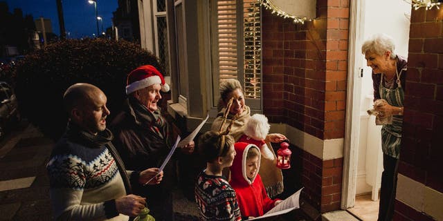 Christmas caroling is a tradition where people sing Christmas songs. Some carolers perform songs at doorsteps or in public squares to spread holiday cheer.