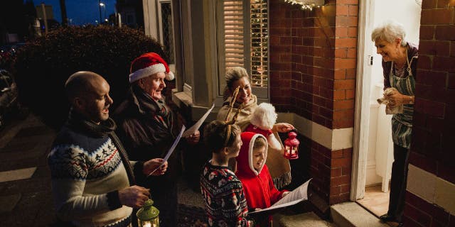 Christmas caroling is a tradition where people sing Christmas songs. Some carolers perform songs at doorsteps or in public squares to spread holiday cheer.