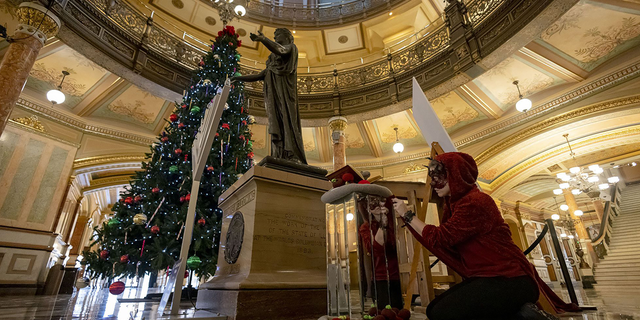 Satanic Temple Installs Holiday Display In Illinois Capitol Next To