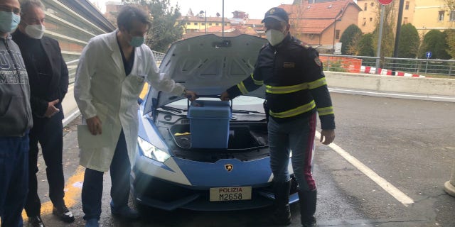 The Lamborghini Huracán is shown being loaded with kidneys to be taken to the hospital.