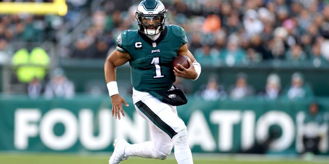 Jalen Hurts #1 of the Philadelphia Eagles runs with the ball in the third quarter of a game against the Tennessee Titans at Lincoln Financial Field on December 4, 2022 in Philadelphia, Pennsylvania.