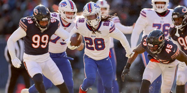 James Cook #28 of the Buffalo Bills rushes for a touchdown against the Chicago Bears during the third quarter of the game at Soldier Field on Dec. 24, 2022 in Chicago, Ill. 